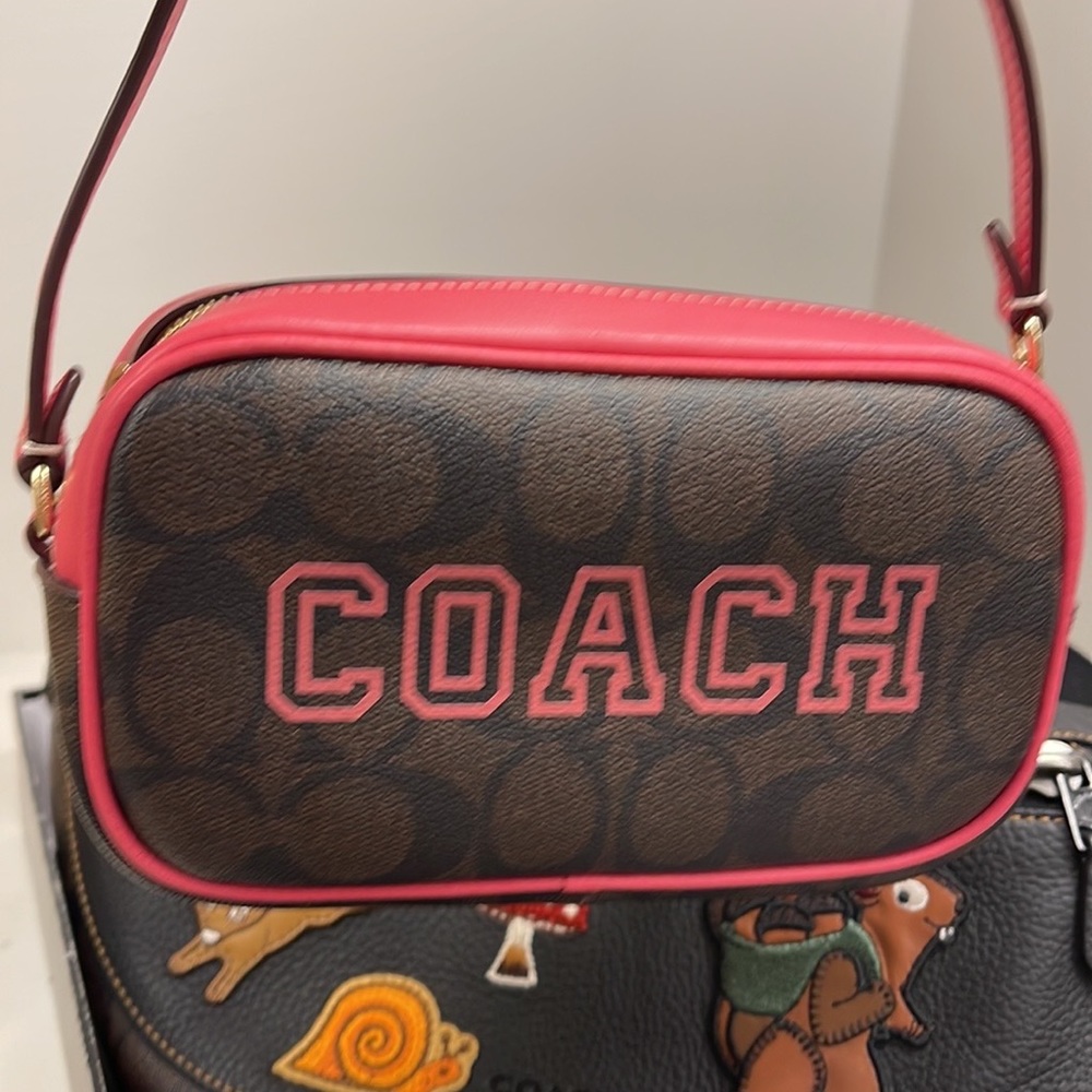 Coach Jamie Wristlet In Signature Canvas With Varsity Motif
IM/Brown/Watermelon - Picture 9 of 16